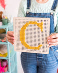 Pegboard Cross Stitch Letter Kit. Mustard