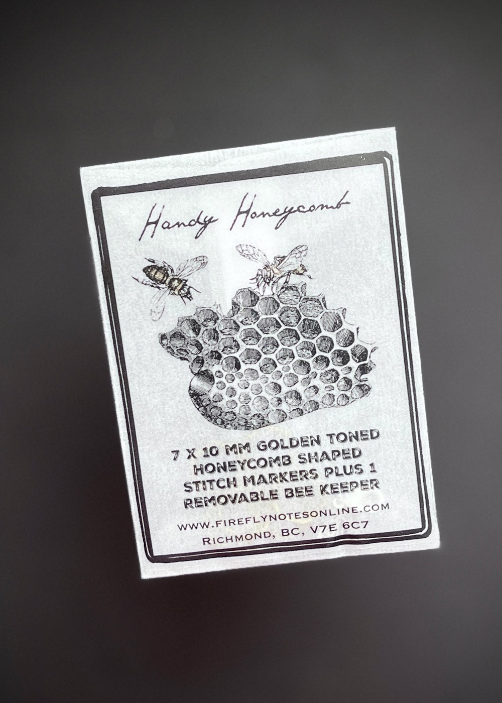 Honeycomb Stitch Marker and Bee Progress Keeper.