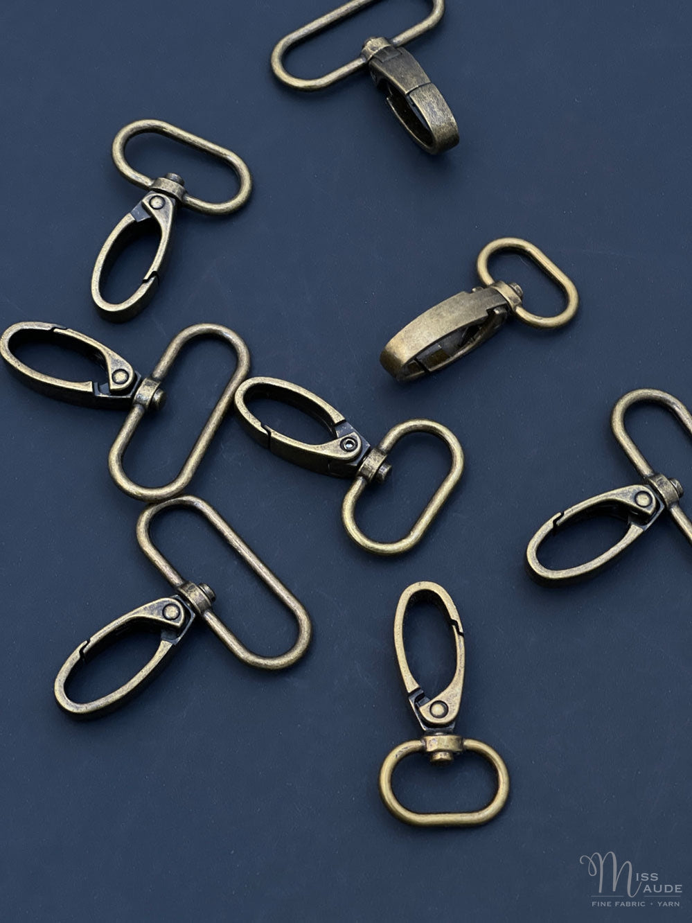 Oval Dog Clip Antique Brass. Various Sizes