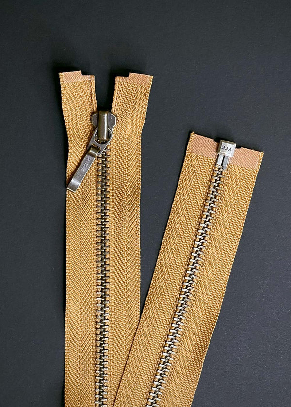 YKK, Open Ended Zip Drop Pull. Antique Brass. Ochre. 60cm