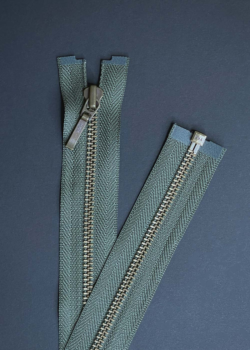 YKK, Open Ended Zip Drop Pull. Antique Brass. Dark Green. 60cm