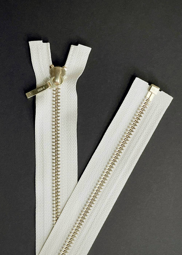 YKK, Open Ended Zip Drop Pull. Brass. Cream. 100cm