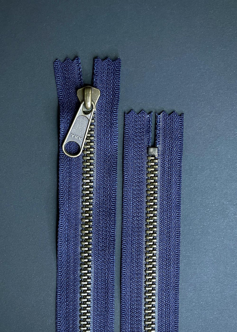 YKK Metaluxe Tough Zip, Antique Brass, Navy. 20cm