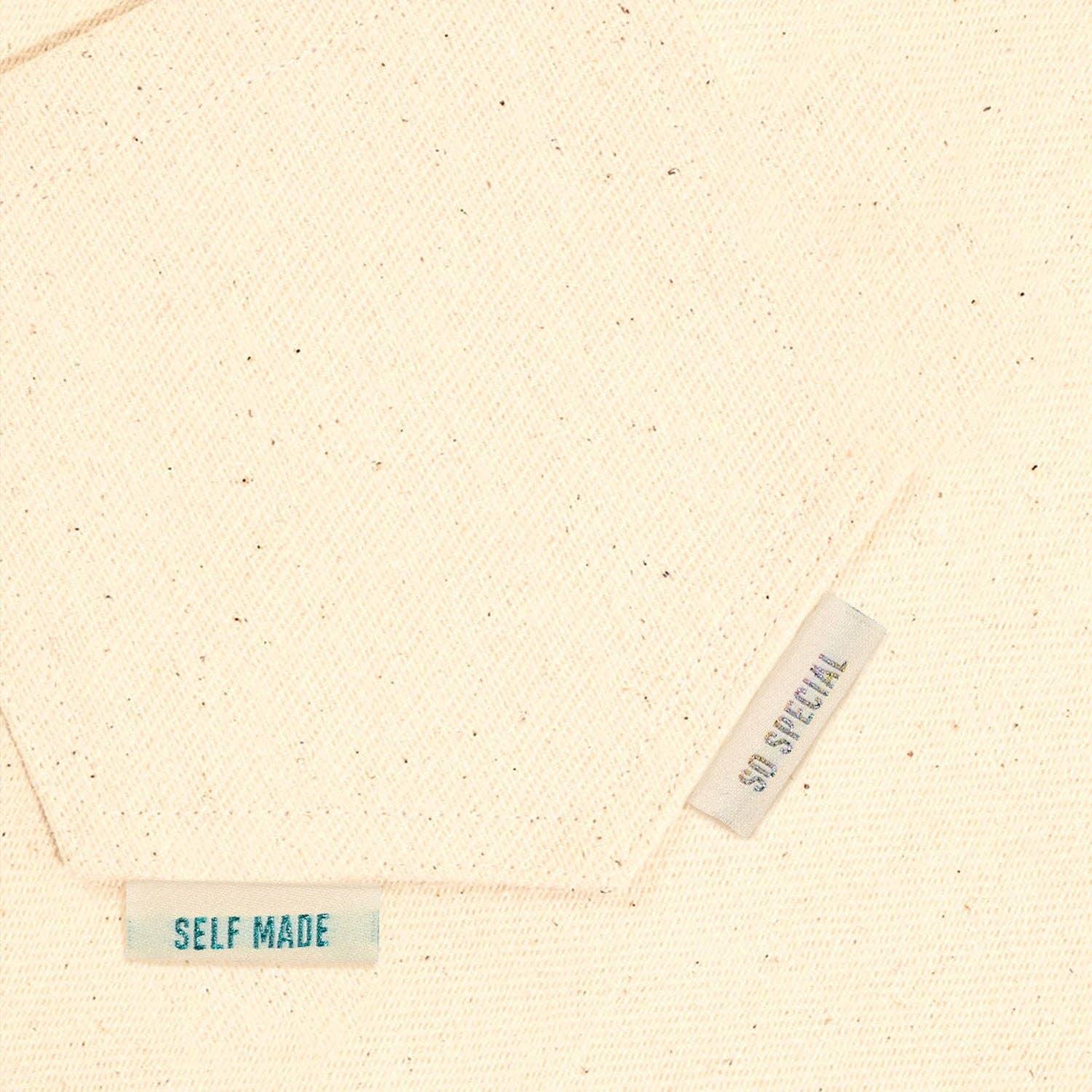 Metallic Side Seam (Cream) Woven Labels