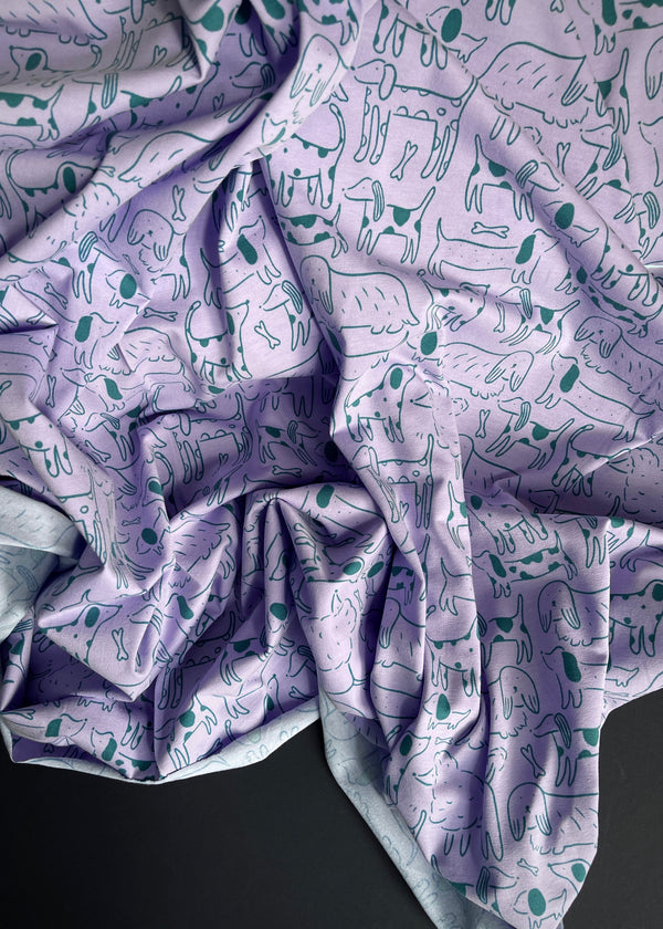 Dog City, Lavender. Cotton Jersey Fabric