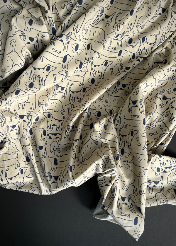 Dog City, Sage. Cotton Jersey Fabric